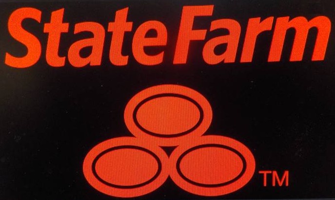 Partial view of the State Farm logo in red on a dark background.